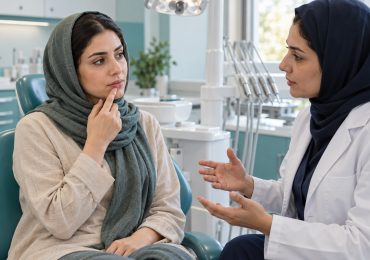 تصویر آموزشی مشاوره بیمار با دندانپزشک درباره برجستگی عودکننده داخل لب